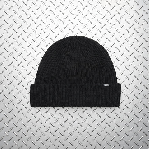 A black ribbed knit beanie hat with a folded cuff, shown against a solid light beige background. A small white Vans logo is visible on the right side of the cuff.