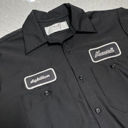 Black work shirt with name tag 