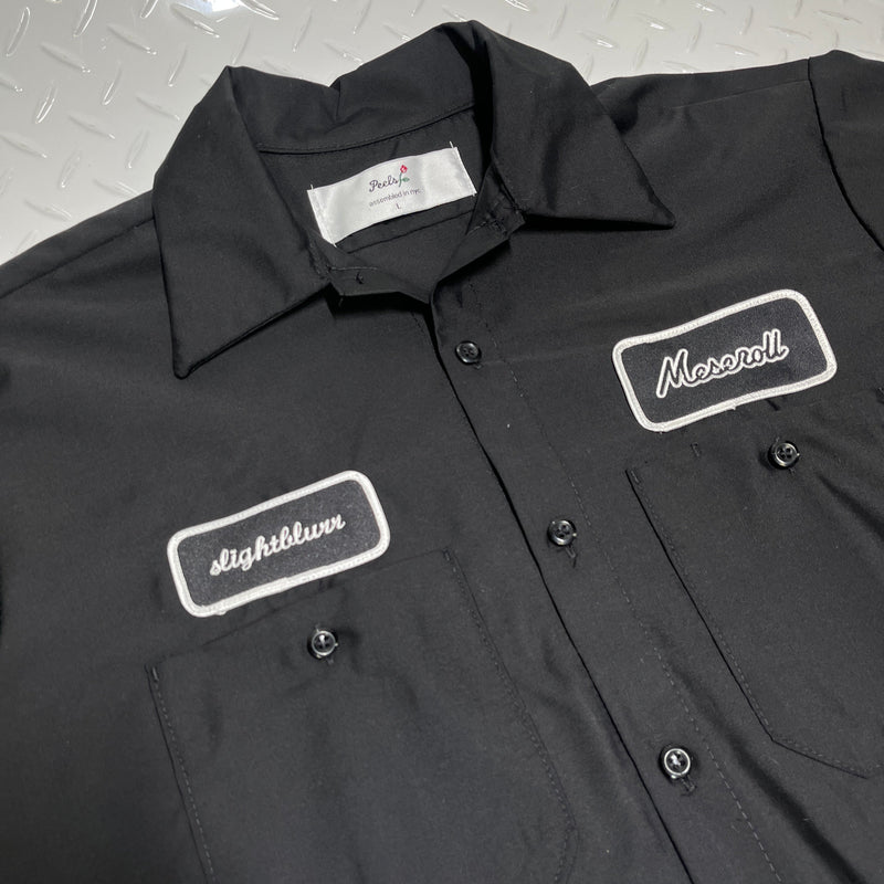 Black work shirt with name tag 