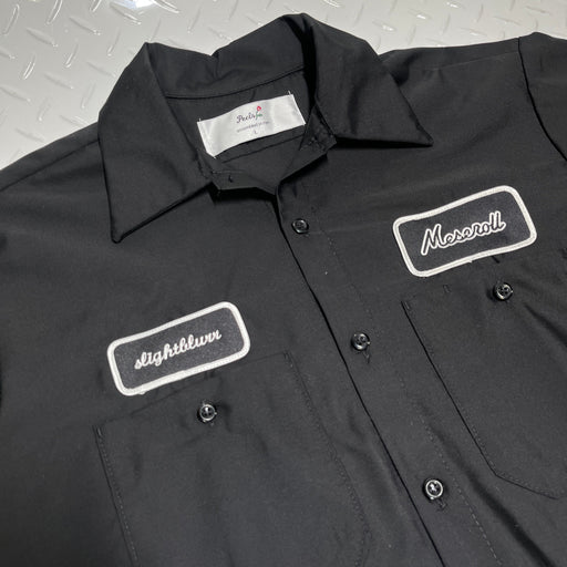 Black work shirt with name tag 