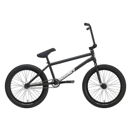 Black BMX bike on a white background